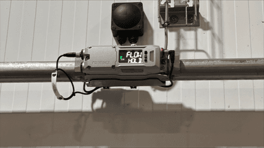 Oil flow meter installed with digital readout
