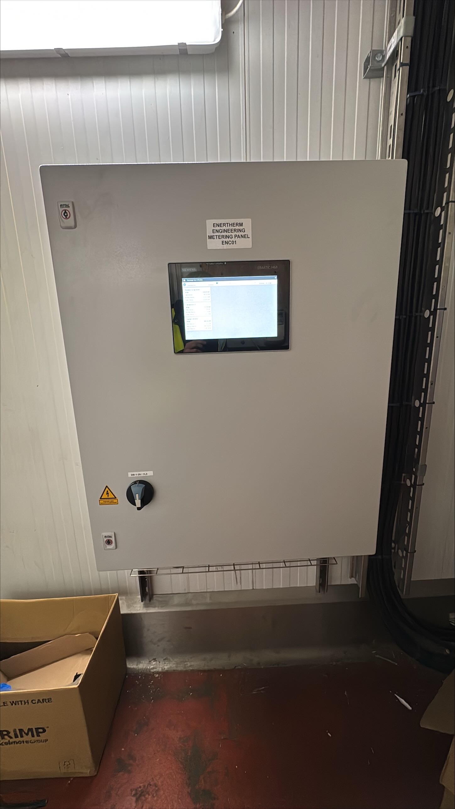 TYPE: photograph
CONTENT: This photograph displays control panel ENC01